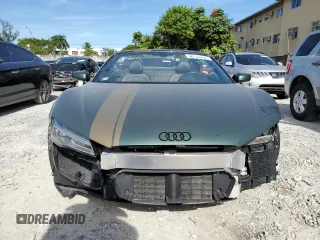 2015 Audi R8 z VIN WUASUAFG1F7001863, wystawiony jako Copart lot #68133794 z przebiegiem 10 571 mil mil oraz Szkody całkowita. Historia ofert i sprzedaży dostępna na DreamBid. Obrazek 5.