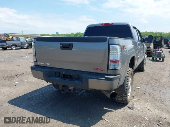 2013 GMC Sierra 2500HD Denali with VIN 1GT125E80DF154320, listed as a IAAI auction lot 42264742 with 171,013 mi miles and . Bid and sale history available at DreamBid. Image 4.