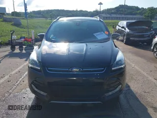 2016 Ford Escape Titanium with VIN 1FMCU9J97GUC21242, listed as a IAAI auction lot 42431567 with 96,946 mi miles and . Bid and sale history available at DreamBid. Image 12.