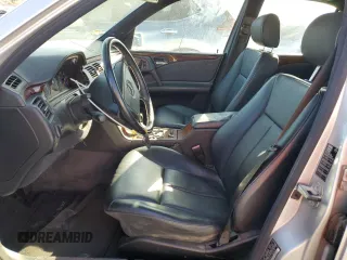 1998 Mercedes-Benz E 320 with VIN WDBJF25F9WA697018, listed as a Copart auction lot 87567315 with 107,255 mi miles and Clean Title. Bid and sale history available at DreamBid. Image 7.