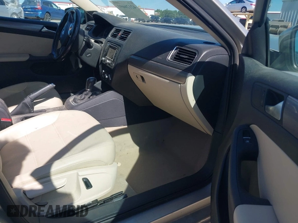2013 Volkswagen Jetta TDI w/Premium/Nav with VIN 3VWLL7AJXDM233999, listed as a IAAI auction lot 42126691 with 151,658 mi miles and . Bid and sale history available at DreamBid. Image 5.