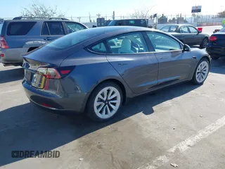 2023 Tesla Model 3 Long Range z VIN 5YJ3E1EB7PF704061, wystawiony jako IAAI lot #42079045 z przebiegiem 4 012 mil mil oraz . Historia ofert i sprzedaży dostępna na DreamBid. Obrazek 4.