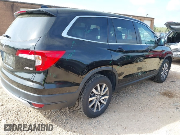 2021 Honda Pilot EX-L with VIN 5FNYF6H57MB064595, listed as a IAAI auction lot 41942327 with 46,150 mi miles and . Bid and sale history available at DreamBid. Image 4.