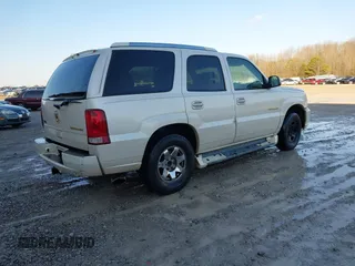 2004 Cadillac Escalade z VIN 1GYEC63T64R231552, wystawiony jako IAAI lot #41428401 z przebiegiem 275 724 mil mil oraz . Historia ofert i sprzedaży dostępna na DreamBid. Obrazek 4.