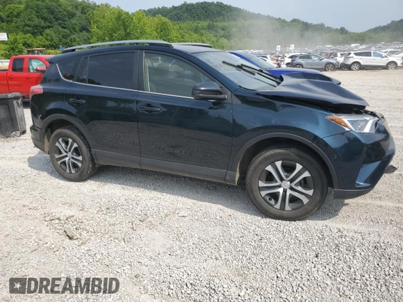 2018 Toyota RAV4 LE with VIN JTMBFREV7JJ253067, listed as a Copart auction lot 60596735 with Not provided miles and Salvage title. Bid and sale history available at DreamBid. Image 4.