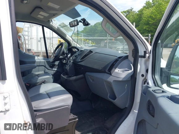 2015 Ford Transit Cargo with VIN 1FTNE1ZM8FKB17731, listed as a IAAI auction lot 42351353 with 74,489 mi miles and . Bid and sale history available at DreamBid. Image 5.