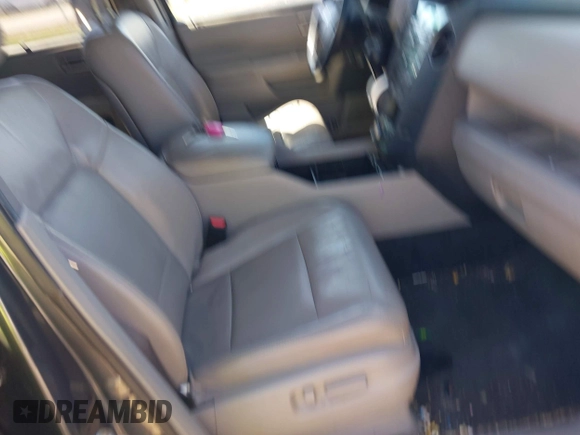 2011 Honda Pilot Touring with VIN 5FNYF4H95BB090892, listed as a IAAI auction lot 41878404 with 131,757 mi miles. Bid and sale history available at carsss.com. Image 5.