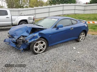 2004 Hyundai Tiburon GT z VIN KMHHN65F04U116166, wystawiony jako Copart lot #51525065 z przebiegiem 153 035 mil mil oraz Szkody całkowita. Historia ofert i sprzedaży dostępna na DreamBid. Obrazek 1.