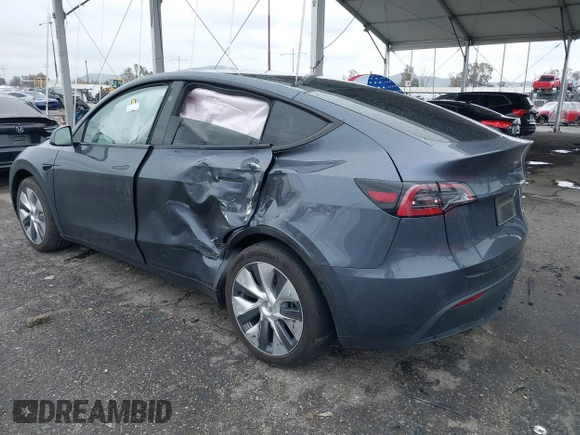 2023 Tesla Model Y Long Range with VIN 7SAYGDEE3PA152683, listed as a IAAI auction lot 41798988 with 14,063 mi miles and . Bid and sale history available at carsss.com. Image 3.