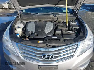 2013 Hyundai Azera z VIN KMHFH4JG3DA230844, wystawiony jako IAAI lot #41817997 z przebiegiem 129 163 mil mil oraz . Historia ofert i sprzedaży dostępna na DreamBid. Obrazek 10.