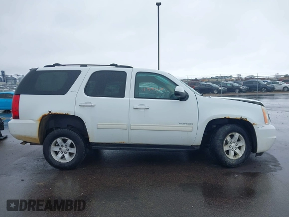 2011 GMC Yukon SLT with VIN 1GKS2CE03BR118690, listed as a IAAI auction lot 41941840 with 243,311 mi miles and . Bid and sale history available at DreamBid. Image 13.