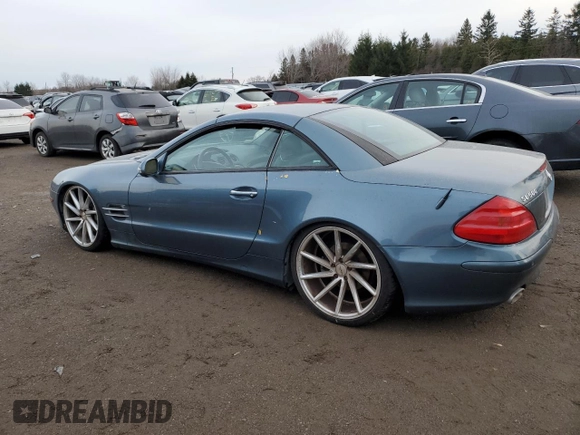 2003 Mercedes-Benz SL 500 with VIN WDBSK75F93F008171, listed as a Copart auction lot 83149314 with 152,312 mi miles and Clean title. Bid and sale history available at DreamBid. Image 2.