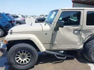 2018 Jeep Wrangler Sahara z VIN 1C4AJWBGXJL811092, wystawiony jako IAAI lot #42305620 z przebiegiem 41 021 mil mil oraz . Historia ofert i sprzedaży dostępna na DreamBid. Obrazek 6.