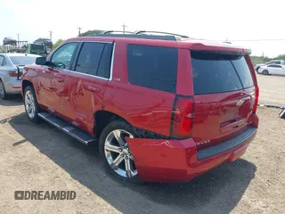 2015 Chevrolet Tahoe LT with VIN 1GNSKBKC6FR628355, listed as a IAAI auction lot 42159743 with 95,730 mi miles and . Bid and sale history available at DreamBid. Image 6.