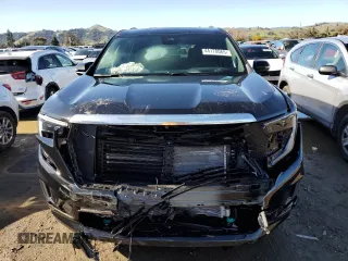 2024 GMC Acadia AWD Denali z VIN 1GKENRKS5RJ238996, wystawiony jako Copart lot #44178065 z przebiegiem 922 mil mil oraz Szkoda całkowita • Salvage title. Historia ofert i sprzedaży dostępna na DreamBid. Obrazek 5.
