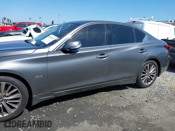 2019 Infiniti Q50 3.0t LUXE with VIN JN1EV7AP5KM519569, listed as a IAAI auction lot 42078137 with 134,486 mi miles. Bid and sale history available at carsss.com. Image 14.