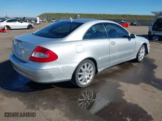 2007 Mercedes-Benz CLK-Class 3.5L with VIN WDBTJ56H27F228074, listed as a IAAI auction lot 41550113 with 129,623 mi miles. Bid and sale history available at carsss.com. Image 4.