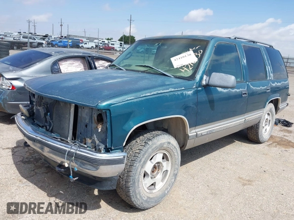 1998 GMC Yukon z VIN 1GKEK13R3WJ715863, wystawiony jako IAAI lot #42410130 z przebiegiem 154 139 mil mil oraz . Historia ofert i sprzedaży dostępna na DreamBid. Obrazek 2.