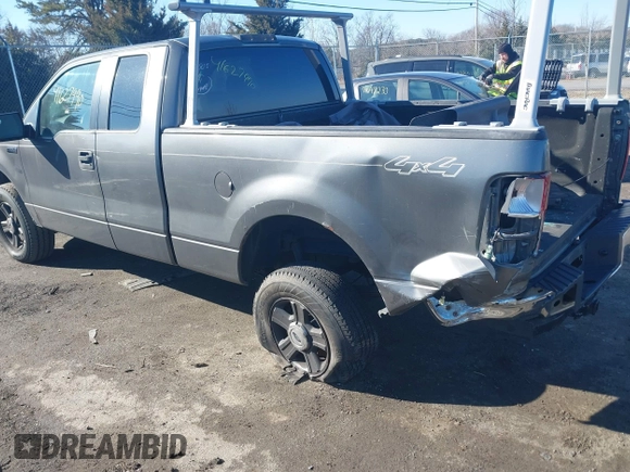 2005 Ford F-150 STX with VIN 1FTRX14W95NB07100, listed as a IAAI auction lot 41627990 with 381,000 mi miles. Bid and sale history available at carsss.com. Image 3.