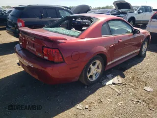 2003 Ford Mustang Standard with VIN 1FAFP40463F427481, listed as a Copart auction lot 57690364 with 0 mi miles and Salvage Title. Bid and sale history available at carsss.com. Image 3.
