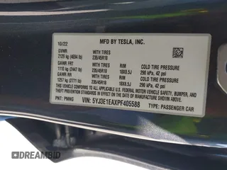 2023 Tesla Model 3 with VIN 5YJ3E1EAXPF405588, listed as a IAAI auction lot 42348952 with 30,788 mi miles and . Bid and sale history available at DreamBid. Image 9.