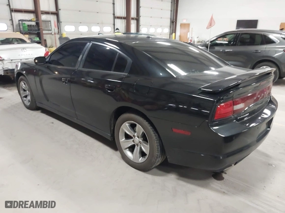 2011 Dodge Charger Road/Track with VIN 2B3CL5CT9BH511648, listed as a IAAI auction lot 42001157 with 103,223 mi miles. Bid and sale history available at carsss.com. Image 3.