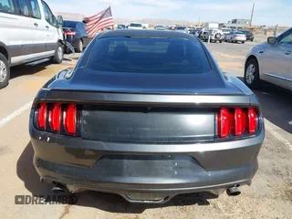 2015 Ford Mustang V6 with VIN 1FA6P8AM5F5318400, listed as a IAAI auction lot 41812625 with 97,728 mi miles and . Bid and sale history available at DreamBid. Image 16.