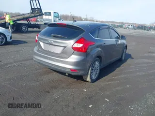 2012 Ford Focus Titanium with VIN 1FAHP3N28CL270225, listed as a IAAI auction lot 41401080 with 80,650 mi miles and . Bid and sale history available at carsss.com. Image 4.