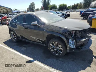 2022 Lexus UX 250h F Sport with VIN JTHE9JBH2N2056763, listed as a Copart auction lot 70052364 with 50,802 mi miles and Salvage Title. Bid and sale history available at DreamBid. Image 4.