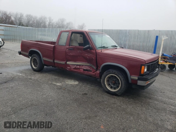 1993 GMC Sonoma z VIN 1GTCS19ZXP8503223, wystawiony jako Copart lot #86344214 z przebiegiem 175 849 mil mil oraz Szkody całkowita. Historia ofert i sprzedaży dostępna na DreamBid. Obrazek 4.