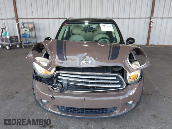 2012 MINI Countryman with VIN WMWZB3C51CWM04563, listed as a IAAI auction lot 42564564 with 95,760 mi miles and . Bid and sale history available at DreamBid. Image 6.