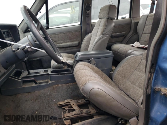 1991 Jeep Cherokee with VIN 1J4FJ58S1ML520376, listed as a Copart auction lot 75452364 with 147,982 mi miles and Salvage title. Bid and sale history available at DreamBid. Image 7.