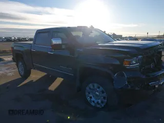 2017 GMC Sierra 2500HD Denali z VIN 1GT12UEG3HF132898, wystawiony jako IAAI lot #41442407 z przebiegiem 83 432 mil mil oraz . Historia ofert i sprzedaży dostępna na DreamBid. Obrazek 1.