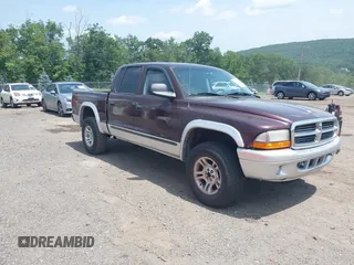 2004 Dodge Dakota SLT z VIN 1D7HG48NX4S649522, wystawiony jako IAAI lot #42580132 z przebiegiem 124 037 mil mil oraz . Historia ofert i sprzedaży dostępna na DreamBid. Obrazek 1.