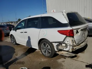 2023 Honda Odyssey Touring with VIN 5FNRL6H80PB024709, listed as a Copart auction lot 47594375 with Not Provided miles and Salvage Title. Bid and sale history available at DreamBid. Image 2.