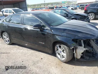 2016 Ford Fusion SE Hybrid с VIN 3FA6P0LU4GR204062, выставлен на аукционе IAAI как лот 42041634 с пробегом 138 876 миль миль и . История ставок и продаж доступна на DreamBid. Изображение 14.