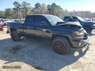 2017 Chevrolet Silverado 1500 LT with VIN 1GCVKREC8HZ339054, listed as a Copart auction lot 49400695 with 127,033 mi miles and Salvage Title. Bid and sale history available at carsss.com. Image 4.