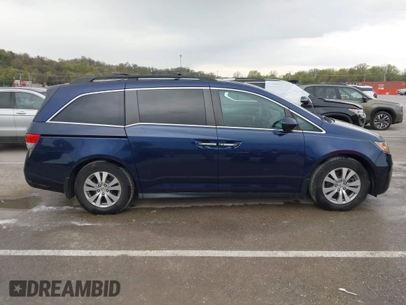 2014 Honda Odyssey EX-L with VIN 5FNRL5H68EB049914, listed as a IAAI auction lot 41986894 with 125,222 mi miles and . Bid and sale history available at carsss.com. Image 13.