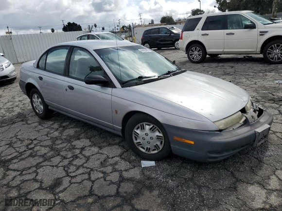 1996 Saturn SL with VIN 1G8ZH5288TZ156412, listed as a Copart auction lot 44429465 with 141,560 mi miles and Salvage Title. Bid and sale history available at carsss.com. Image 4.