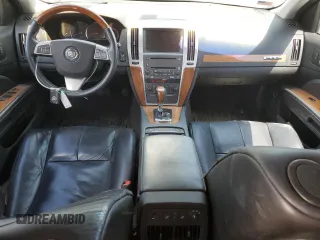 2008 Cadillac STS RWD z VIN 1G6DK67V980143995, wystawiony jako Copart lot #56365325 z przebiegiem 128 787 mil mil oraz Szkody całkowita. Historia ofert i sprzedaży dostępna na DreamBid. Obrazek 8.