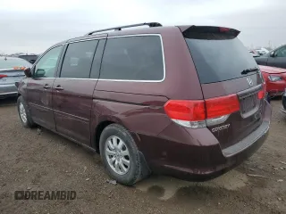 2010 Honda Odyssey EX-L with VIN 5FNRL3H62AB007415, listed as a Copart auction lot 52200245 with 184,601 mi miles and Salvage Title. Bid and sale history available at DreamBid. Image 2.