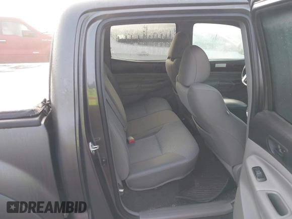 2015 Toyota Tacoma with VIN 3TMLU4EN7FM201302, listed as a IAAI auction lot 41666606 with 200,504 mi miles and . Bid and sale history available at DreamBid. Image 8.