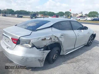 2016 Nissan Maxima SL with VIN 1N4AA6AP0GC433932, listed as a IAAI auction lot 41897180 with 91,871 mi miles and . Bid and sale history available at DreamBid. Image 6.
