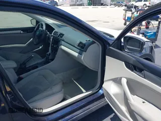 2014 Volkswagen Passat S with VIN 1VWAP7A30EC025369, listed as a IAAI auction lot 42525534 with 169,000 mi miles and . Bid and sale history available at DreamBid. Image 5.