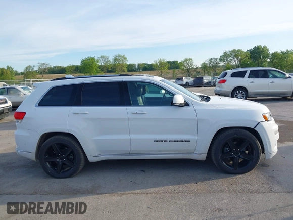 2018 Jeep Grand Cherokee Summit with VIN 1C4RJFJG0JC107732, listed as a IAAI auction lot 42328645 with 109,601 mi miles and . Bid and sale history available at DreamBid. Image 14.