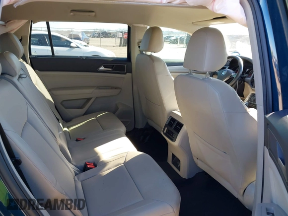 2019 Volkswagen Atlas SE with VIN 1V2DR2CA9KC506188, listed as a IAAI auction lot 41221389 with 67,593 mi miles and . Bid and sale history available at DreamBid. Image 8.