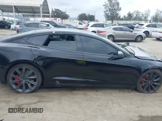 2017 Tesla Model S 60 with VIN 5YJSA1E12HF195965, listed as a IAAI auction lot 41946148 with 63,992 mi miles and . Bid and sale history available at DreamBid. Image 13.