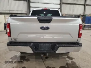 2018 Ford F-150 XL with VIN 1FTFW1E50JFB35013, listed as a Copart auction lot 57240755 with 127,401 mi miles and Salvage title. Bid and sale history available at DreamBid. Image 6.