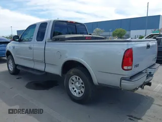2001 Ford F-150 XL with VIN 1FTRX18L91KF29881, listed as a IAAI auction lot 42021554 with 199,041 mi miles. Bid and sale history available at carsss.com. Image 3.
