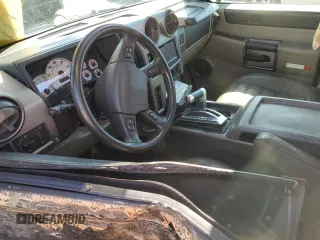 2003 Hummer H2 with VIN 5GRGN23U83H134284, listed as a Copart auction lot 70259154 with 0 mi miles and Salvage Title. Bid and sale history available at carsss.com. Image 7.